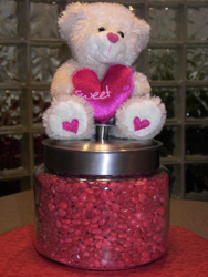How many red candy hearts are in the jar?