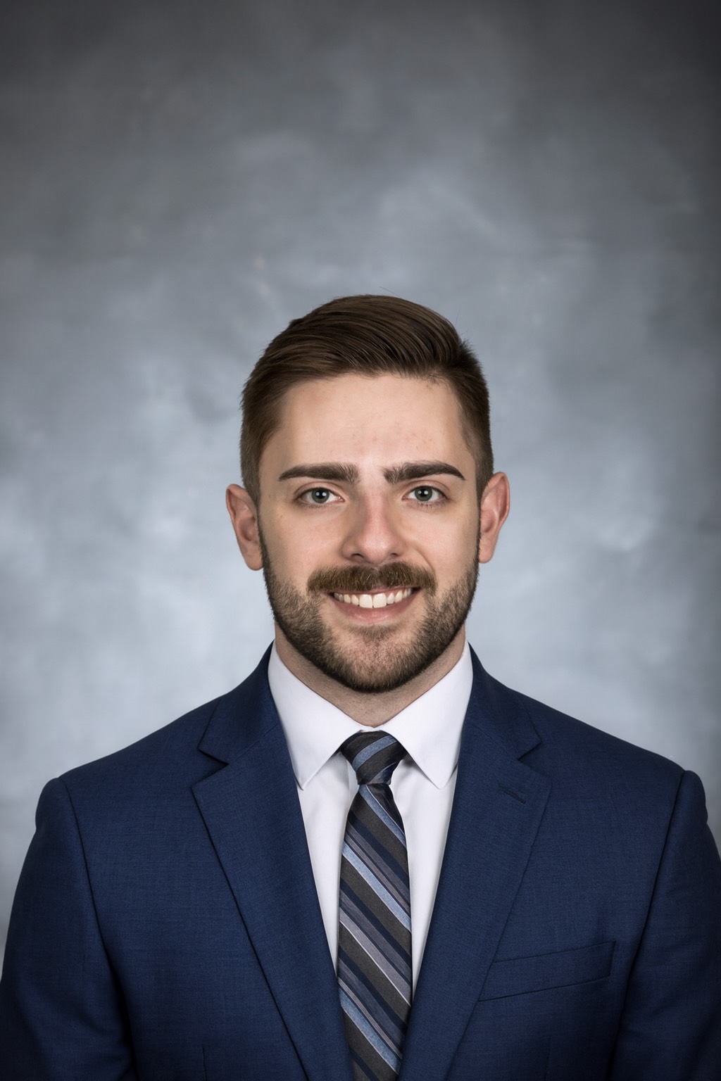 Portrait of Dr Jordan Boehlke,